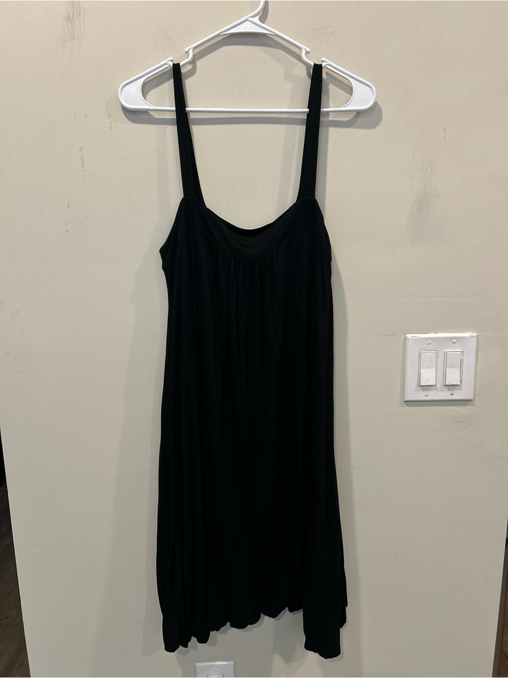 Black sleeveless tank-style balloon dress gathered at the neckline. Size  Small
